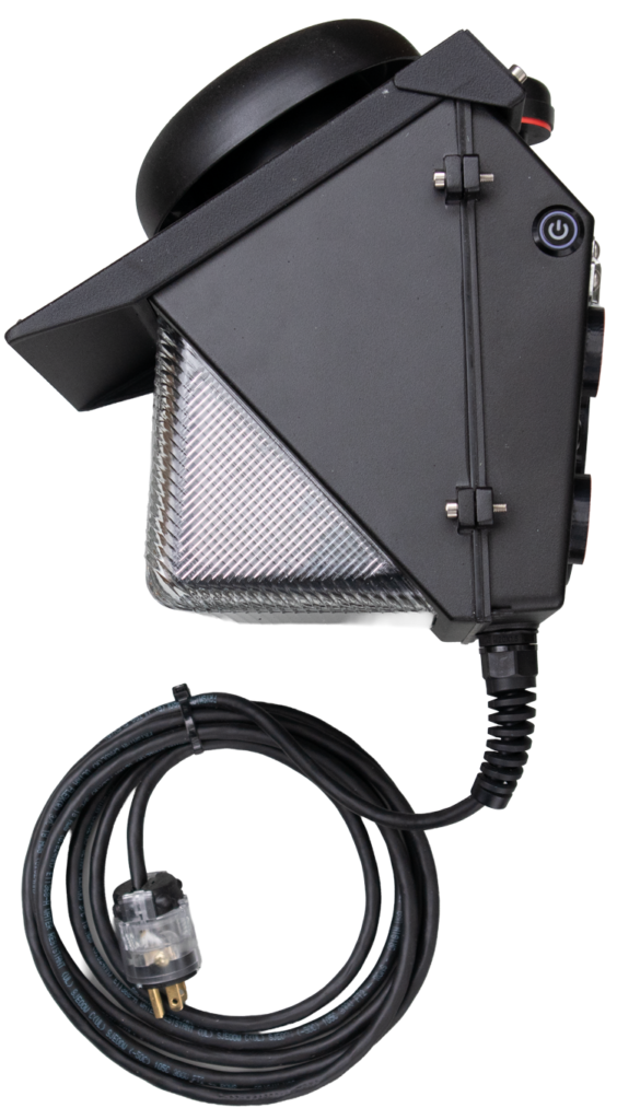 Left side view of the PortaBell wall-mounted bell and light unit showing the main power switch with green indicator light, warning light lens, bell housing, power cord, and plug.